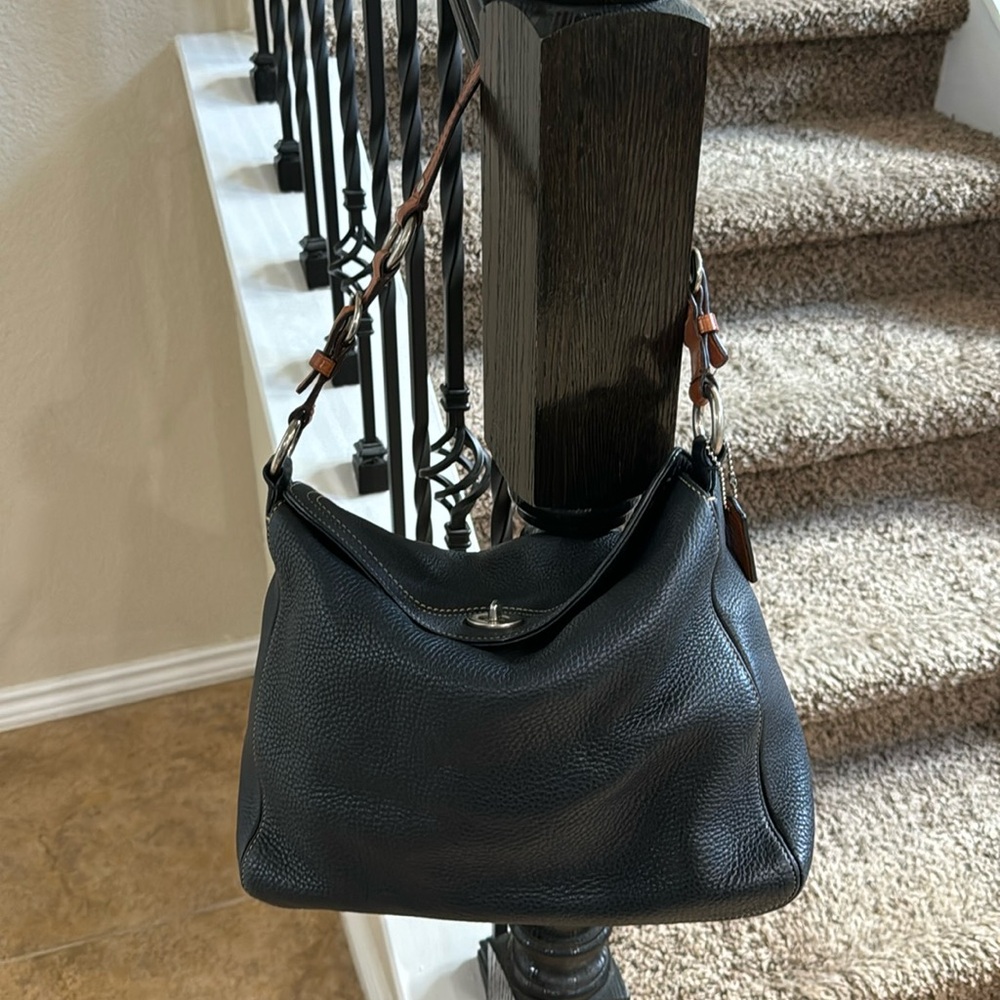 Authentic Coach leather purse. EUC. Black with brown/tan strap